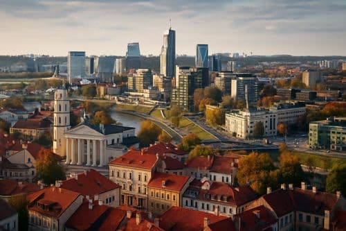 Aerial Vilnius old town with the cathedral bell tower and business district behind