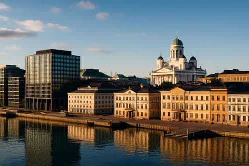 Helsinki Cathedral rising white above the harbour buildings