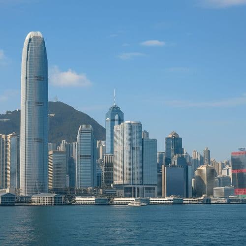 Hong Kong towers across Victoria Harbour with the Peak behind
